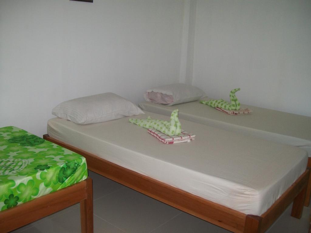 Charm Guest House Puerto Princesa Habitación foto